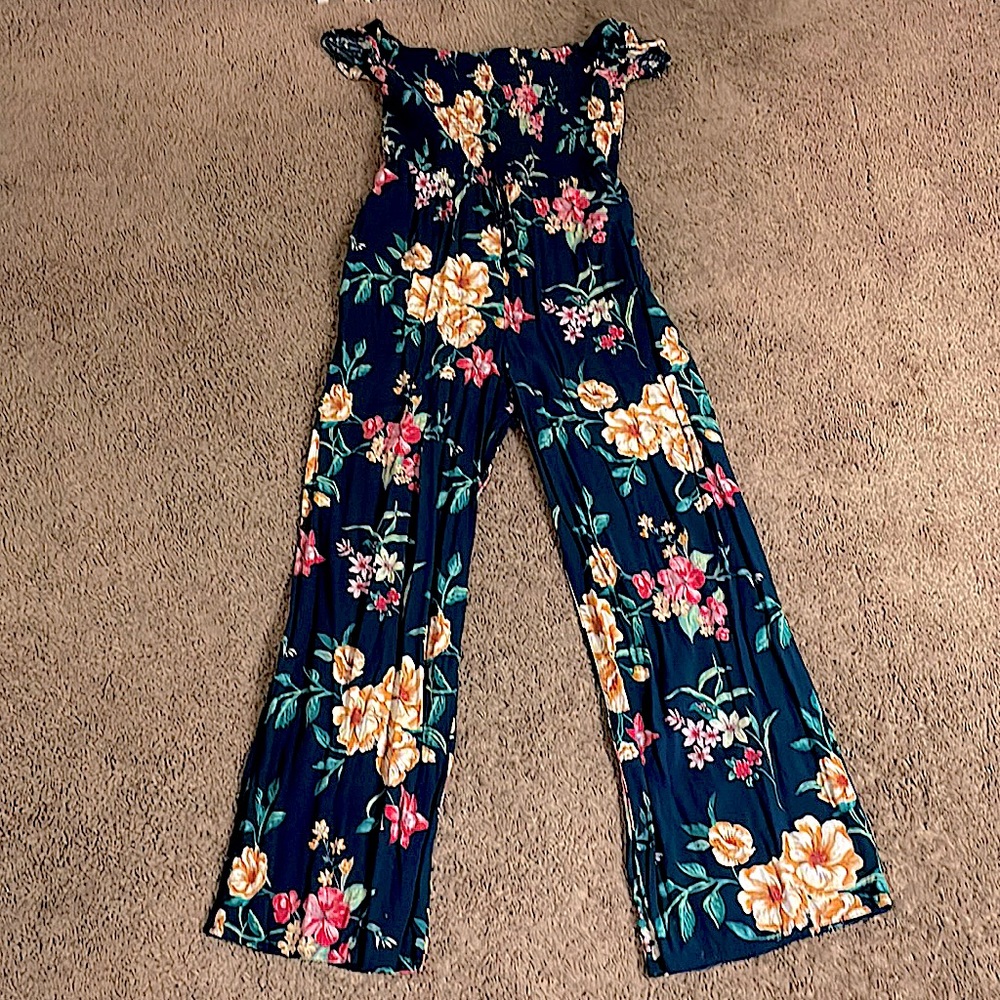 This is a floral jumpsuit that was store-bout about 4 years ago.